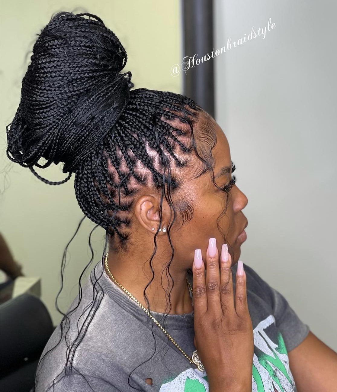 Braided Bun with Thin Tendrils