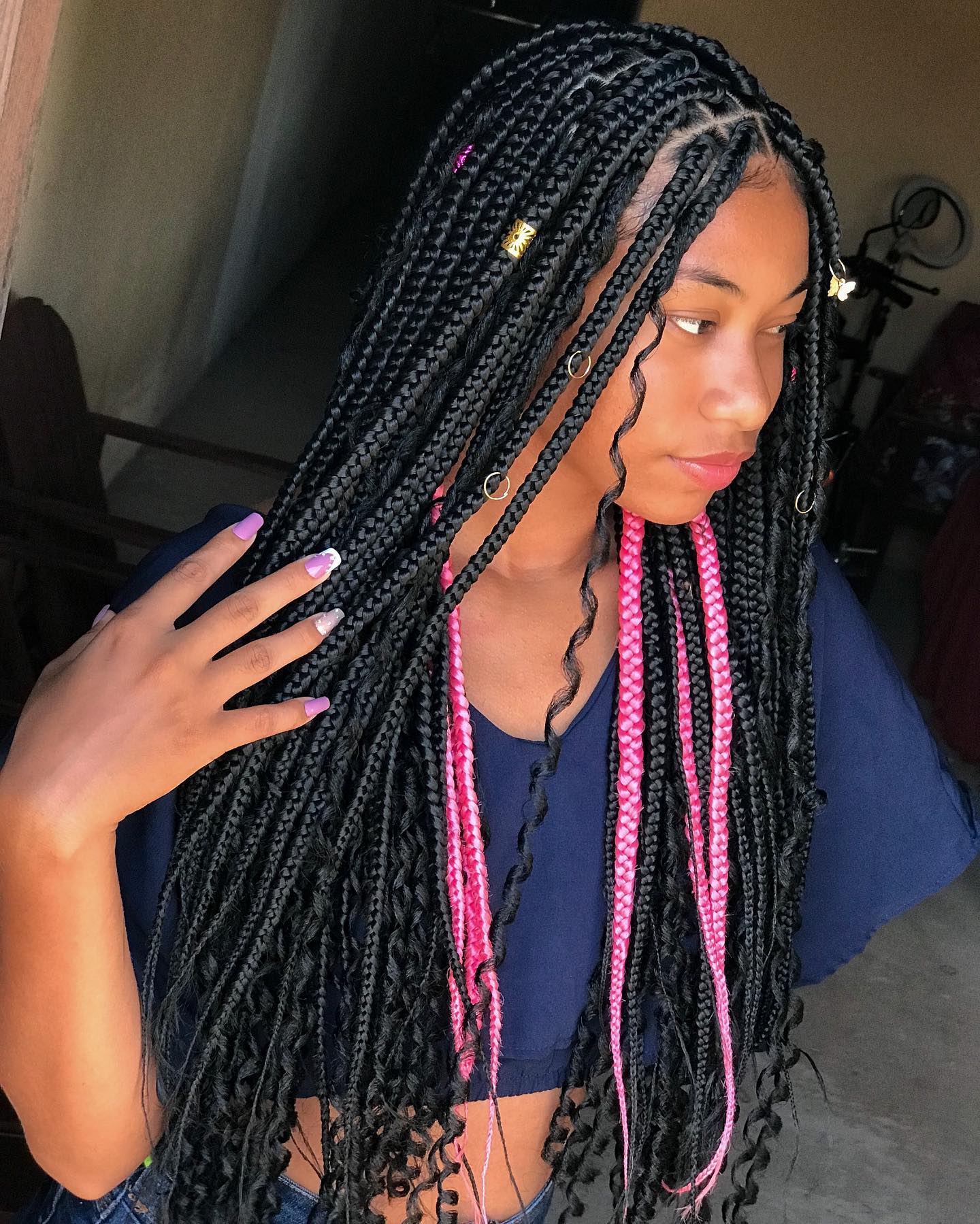 Black Box Braids with Pink Peekaboo Highlights